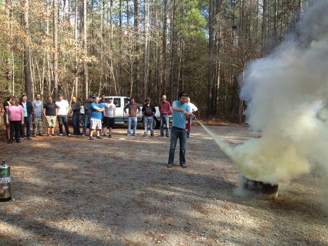 Fire Extinguisher Training for the Councilors of the Cameron Boy's Camp.